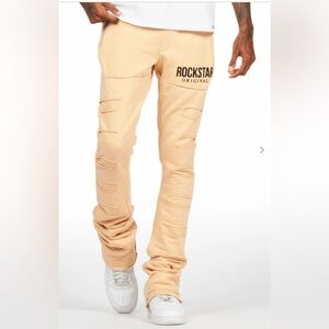 Emilio Beige Stacked Flare Track Pants
Size: XL